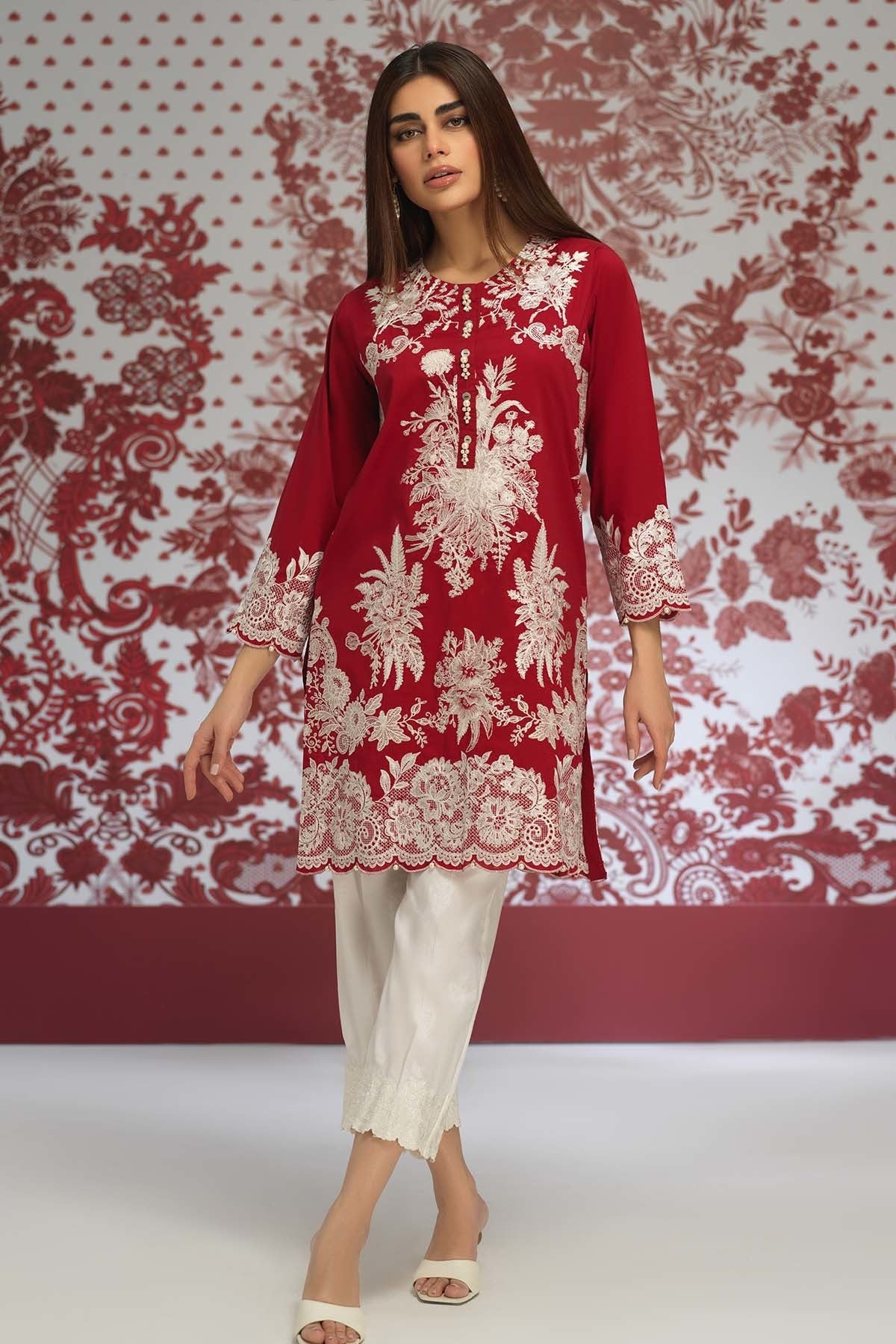 khaadi red dress Crimson red embroidered Khaadi net Angrakha with crystal and Ruby red embellishments. Paired with an embroidered Khaadi net dupatta with lace edging and crepe Lehnga with ruffled hemline. https://www.ayesha-somaya.com/product/dress-code-smf-521/ Shop